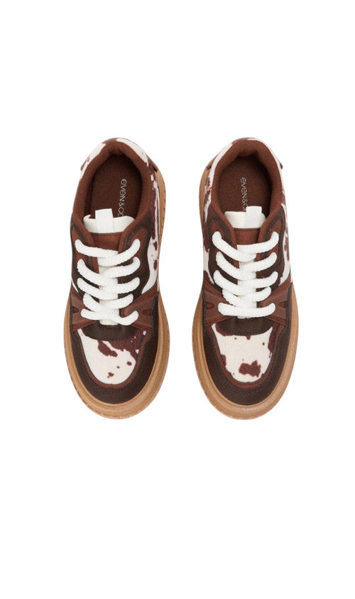 Baskets basses Clueless Paris à plateforme, motif animal marron et blanc avec lacets épais et semelle crantée