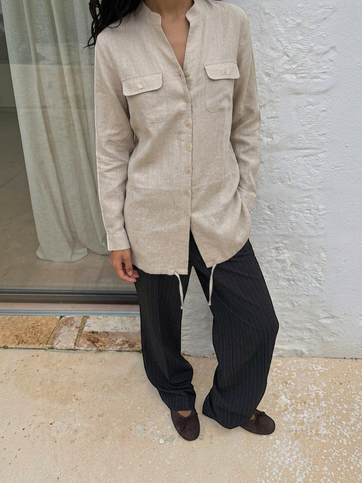 Clueless Paris beige button-down shirt with mandarin collar, two chest pockets, and drawstring hem in a fluid fit.