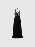 Clueless Paris long black evening gown featuring a fitted bodice with silver baroque patterns and a halter neckline.