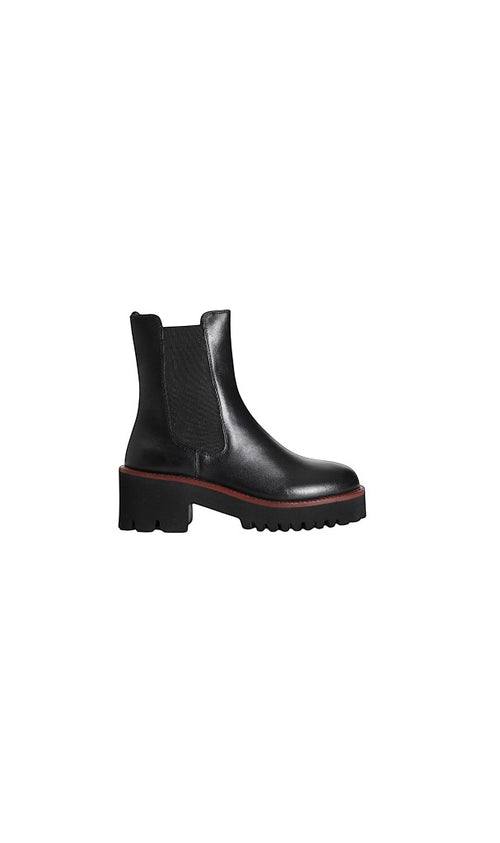 Bottines Chelsea Clueless Paris en cuir noir avec semelle crantée épaisse et empiècements élastiques latéraux