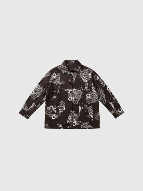 Clueless Paris long-sleeve shirt in deep brown with a white abstract graphic print, classic collar, and button front.