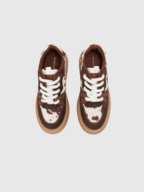 Clueless Paris even&odd brown chocolate platform sneakers with a textured animal print and thick white laces.
