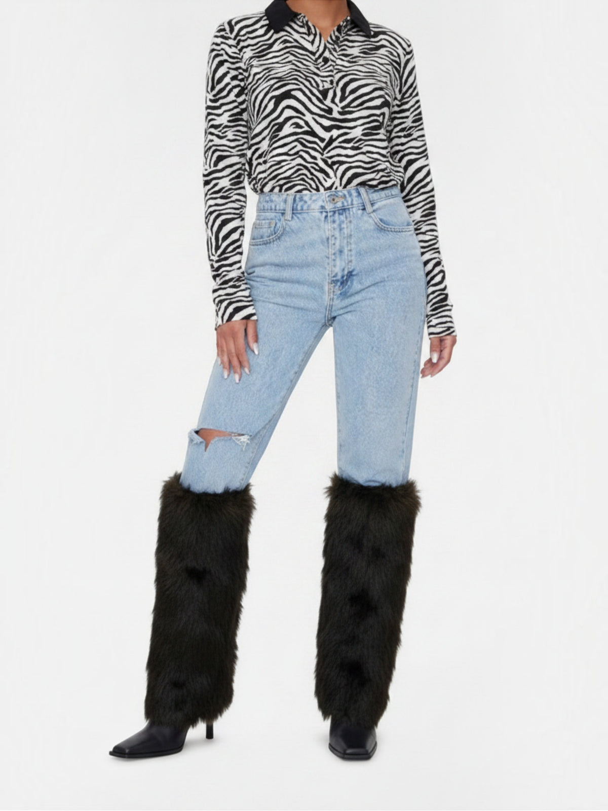 Clueless Paris black faux leather stiletto boots with plush faux fur trim worn with light wash distressed jeans