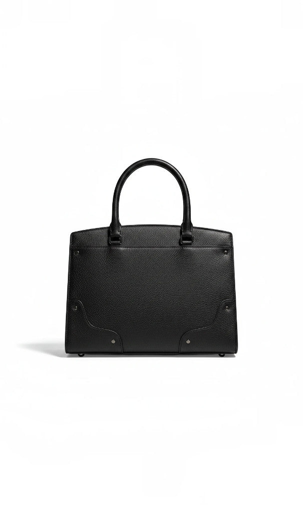 Sac à main Clueless Paris structuré en cuir grainé noir avec poignées rigides et finitions métalliques élégantes