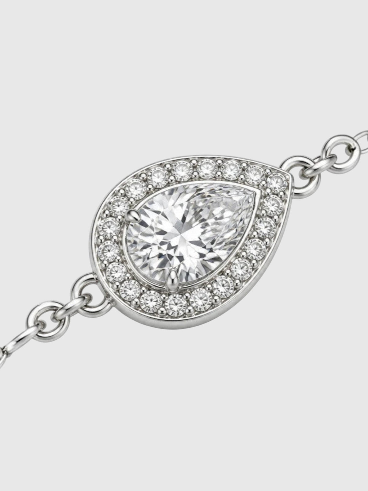 Clueless Paris 925 silver chain bracelet featuring a teardrop-shaped cubic zirconia pendant with a halo setting.