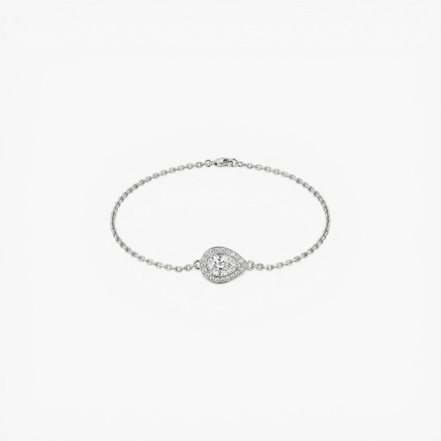 Bracelet en argent fin avec pendentif central en forme de poire serti d'un gros cristal et de petits diamants scintillants - Clueless Paris